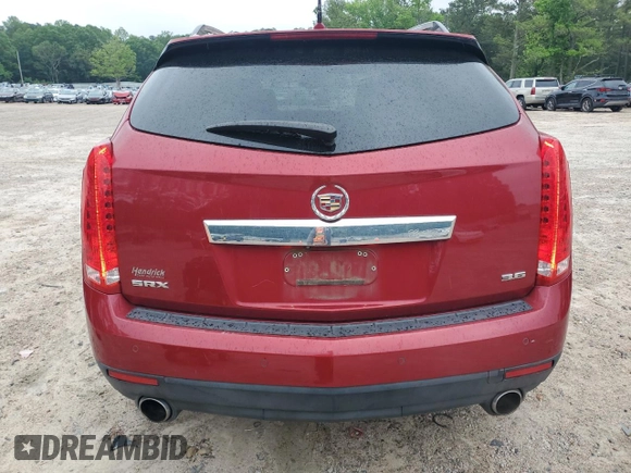 2014 Cadillac SRX Performance Collection z VIN 3GYFNCE32ES560497, wystawiony jako Copart lot #53107835 z przebiegiem 140 378 mil mil oraz Szkoda całkowita • Salvage title. Historia ofert i sprzedaży dostępna na DreamBid. Obrazek 6.
