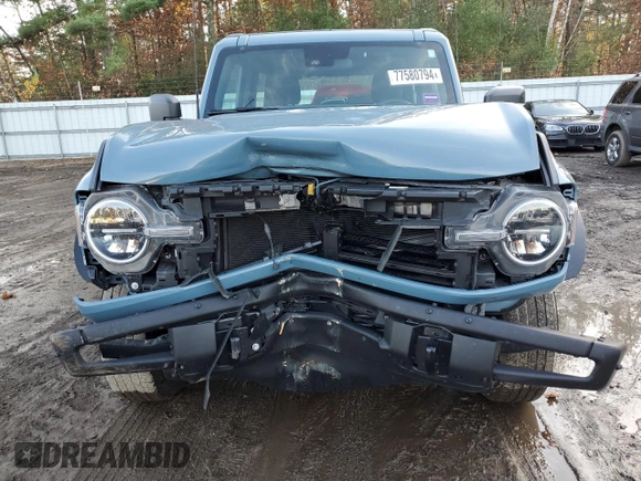 2022 Ford Bronco z VIN 1FMDE5AH6NLB71051, wystawiony jako Copart lot #77580794 z przebiegiem 20 904 mil mil oraz Szkoda całkowita • Salvage title. Historia ofert i sprzedaży dostępna na DreamBid. Obrazek 5.