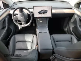 2024 Tesla Model Y Long Range z VIN 7SAYGDEE8RF986258, wystawiony jako Copart lot #58434275 z przebiegiem 59 934 mil mil oraz Szkoda całkowita • Salvage title. Historia ofert i sprzedaży dostępna na DreamBid. Obrazek 8.