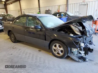1998 Lexus ES 300 Luxury Sport Sdn with VIN JT8BF28G0W5044806, listed as a Copart auction lot 83248754 with 276,797 mi miles and Salvage Title. Bid and sale history available at carsss.com. Image 4.