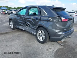 2020 Ford Edge SEL with VIN 2FMPK4J90LBA60985, listed as a IAAI auction lot 41590512 with 141,733 mi miles. Bid and sale history available at carsss.com. Image 3.