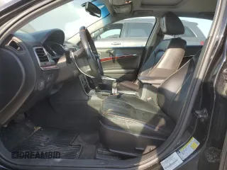 2010 Lincoln MKZ with VIN 3LNHL2GC6AR609449, listed as a Copart auction lot 49660735 with 100,527 mi miles and Salvage title. Bid and sale history available at DreamBid. Image 7.