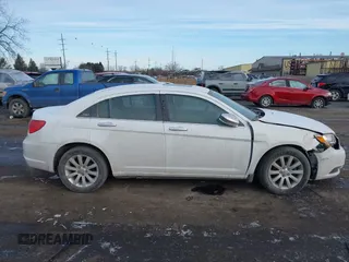 2014 Chrysler 200 Limited with VIN 1C3CCBCG2EN186518, listed as a IAAI auction lot 41521448 with 63,527 mi miles and . Bid and sale history available at DreamBid. Image 13.