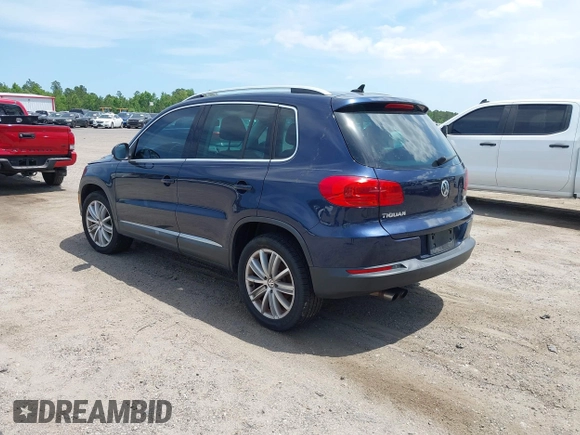 2012 Volkswagen Tiguan SEL with VIN WVGAV7AX7CW608637, listed as a IAAI auction lot 42173987 with 149,013 mi miles and . Bid and sale history available at DreamBid. Image 3.