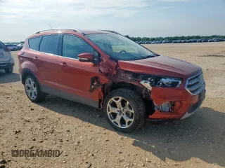 2019 Ford Escape Titanium с VIN 1FMCU9J95KUB54634, выставлен на аукционе Copart как лот 58171885 с пробегом 39 823 миль миль и Списание • Salvage title. История ставок и продаж доступна на DreamBid. Изображение 4.