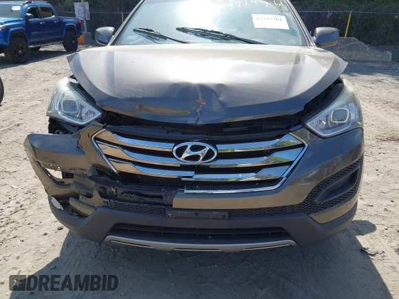 2014 Hyundai Santa Fe with VIN 5XYZTDLB2EG143925, listed as a IAAI auction lot 42243761 with 126,058 mi miles and . Bid and sale history available at DreamBid. Image 6.