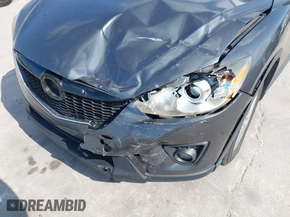 2015 Mazda CX-5 Touring with VIN JM3KE2CY9F0468199, listed as a IAAI auction lot 42099253 with 110,909 mi miles and . Bid and sale history available at carsss.com. Image 6.