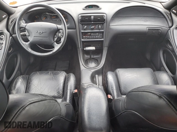 1996 Ford Mustang GT z VIN 1FALP42X8TF196321, wystawiony jako Copart lot #50874885 z przebiegiem 86 945 mil mil oraz Szkoda całkowita • Salvage title. Historia ofert i sprzedaży dostępna na DreamBid. Obrazek 8.