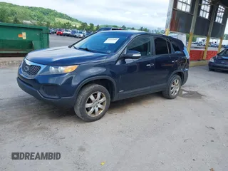 2013 Kia Sorento LX with VIN 5XYKTCA60DG403769, listed as a IAAI auction lot 42265980 with 215,013 mi miles and . Bid and sale history available at DreamBid. Image 2.