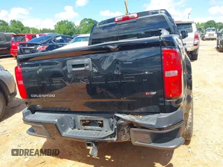 2022 Chevrolet Colorado 4WD Z71 z VIN 1GCGTDEN5N1327500, wystawiony jako IAAI lot #42265450 z przebiegiem 48 680 mil mil oraz . Historia ofert i sprzedaży dostępna na DreamBid. Obrazek 16.