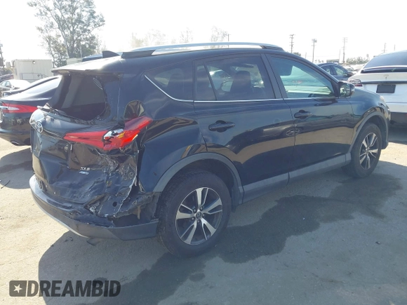 2016 Toyota RAV4 XLE with VIN 2T3RFREV6GW459313, listed as a IAAI auction lot 42074337 with 149,914 mi miles and . Bid and sale history available at DreamBid. Image 4.