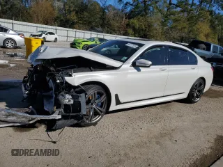 2018 BMW 7 Series 740i with VIN WBA7E2C59JG743247, listed as a Copart auction lot 88777325 with 69,071 mi miles and Salvage Title. Bid and sale history available at carsss.com. Image 1.