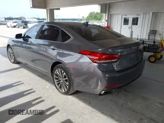 2017 Genesis G80 3.8L z VIN KMHGN4JE4HU171285, wystawiony jako IAAI lot #42197648 z przebiegiem 125 192 mil mil oraz . Historia ofert i sprzedaży dostępna na DreamBid. Obrazek 3.