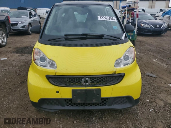 2013 Smart fortwo Pure z VIN WMEEJ3BA2DK663432, wystawiony jako Copart lot #63203755 z przebiegiem 79 786 mil mil oraz Czysty tytuł • Clean title. Historia ofert i sprzedaży dostępna na DreamBid. Obrazek 5.