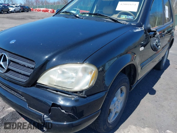 2000 Mercedes-Benz M 320/430/500 with VIN 4JGAB54E5YA165724, listed as a IAAI auction lot 42001654 with 138,997 mi miles and . Bid and sale history available at DreamBid. Image 6.
