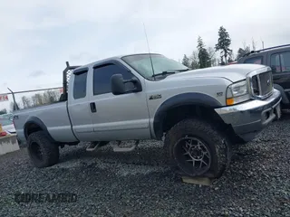 2001 Ford Super Duty F-250 XL with VIN 1FTNX21S01EB08460, listed as a IAAI auction lot 41890597 with 218,302 mi miles. Bid and sale history available at carsss.com. Image 13.