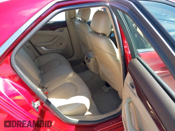 2009 Cadillac CTS RWD w/1SA with VIN 1G6DF577290142964, listed as a IAAI auction lot 42017475 with 171,696 mi miles. Bid and sale history available at carsss.com. Image 8.