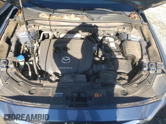 2020 Mazda CX-5 Touring with VIN JM3KFACM8L0774374, listed as a Copart auction lot 42870895 with 71,925 mi miles and Salvage Title. Bid and sale history available at DreamBid. Image 12.