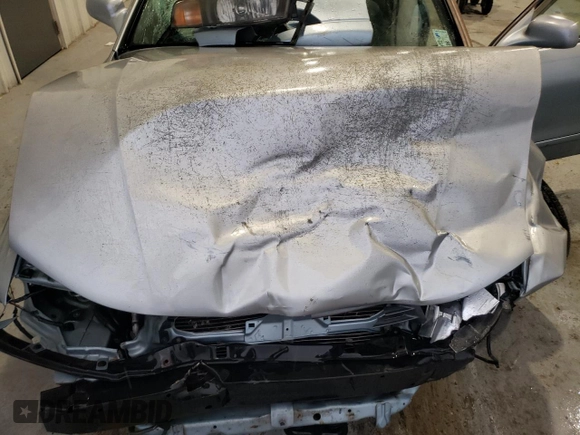 2003 Mitsubishi Galant ES z VIN 4A3AA46H93E144513, wystawiony jako Copart lot #84241744 z przebiegiem 99 849 mil mil oraz Szkoda całkowita • Salvage title. Historia ofert i sprzedaży dostępna na DreamBid. Obrazek 12.