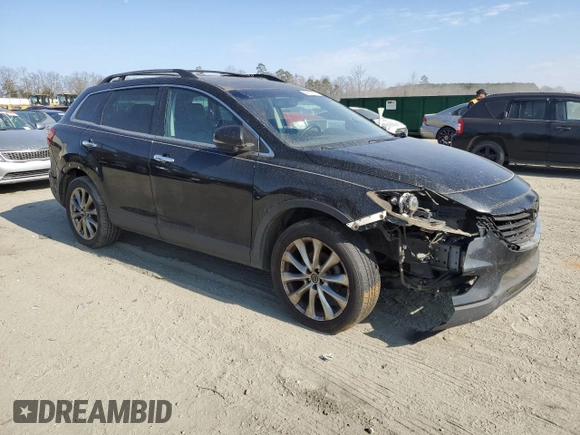 2015 Mazda CX-9 Grand Touring with VIN JM3TB2DA1F0457499, listed as a Copart auction lot 44647895 with 216,229 mi miles and Clean Title. Bid and sale history available at DreamBid. Image 4.