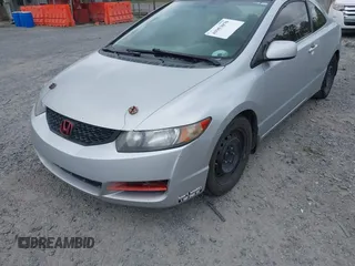 2010 Honda Civic Cpe LX with VIN 2HGFG1B60AH523854, listed as a IAAI auction lot 41953070 with 308,179 mi miles. Bid and sale history available at carsss.com. Image 6.