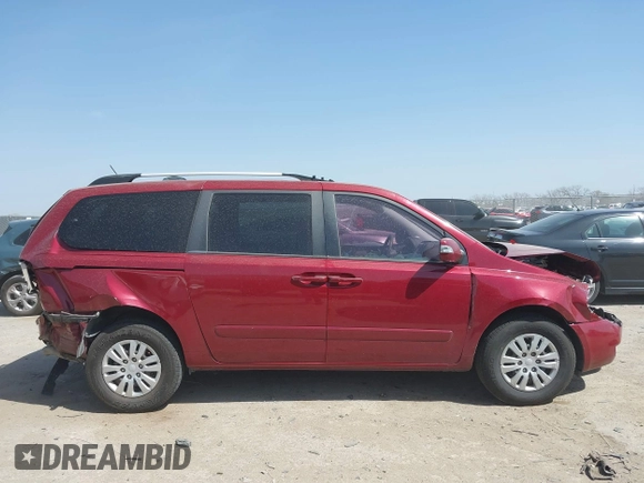 2012 Kia Sedona LX with VIN KNDMG4C70C6463190, listed as a IAAI auction lot 41781336 with 179,860 mi miles. Bid and sale history available at carsss.com. Image 13.