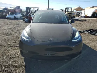 2022 Tesla Model Y Long Range z VIN 7SAYGDEE2NF391349, wystawiony jako Copart lot #85351924 z przebiegiem 5 670 mil mil oraz Szkoda całkowita • Salvage title. Historia ofert i sprzedaży dostępna na DreamBid. Obrazek 5.