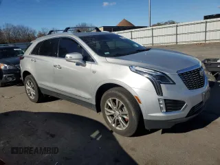 2020 Cadillac XT5 Premium Luxury FWD with VIN 1GYKNCRS4LZ228450, listed as a Copart auction lot 80534104 with Not provided miles and Salvage title. Bid and sale history available at DreamBid. Image 4.