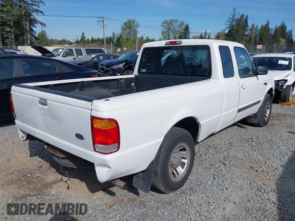 1999 Ford Ranger XLT with VIN 1FTYR14X0XPA65325, listed as a IAAI auction lot 42009611 with 218,657 mi miles. Bid and sale history available at carsss.com. Image 4.
