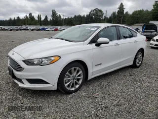 2017 Ford Fusion Hybrid SE z VIN 3FA6P0LU3HR355105, wystawiony jako Copart lot #62189435 z przebiegiem 135 188 mil mil oraz Szkoda całkowita • Salvage title. Historia ofert i sprzedaży dostępna na DreamBid. Obrazek 1.