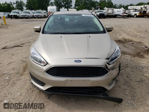 2017 Ford Focus SE with VIN 1FADP3F24HL291691, listed as a Copart auction lot 60596685 with 111,604 mi miles and Clean title. Bid and sale history available at DreamBid. Image 5.