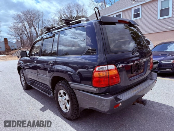 2002 Toyota Land Cruiser z VIN JTEHT05J622022972, wystawiony jako Copart lot #59201475 z przebiegiem 299 548 mil mil oraz Czysty tytuł • Clean title. Historia ofert i sprzedaży dostępna na DreamBid. Obrazek 3.