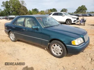 1994 Mercedes-Benz C 220 with VIN WDBHA22E5RF084524, listed as a Copart auction lot 73287364 with 187,541 mi miles and Salvage Title. Bid and sale history available at carsss.com. Image 4.