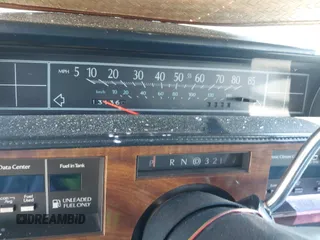 1986 Cadillac DeVille z VIN 1G6CD4783G4204155, wystawiony jako IAAI lot #42229194 z przebiegiem 131 360 mil mil oraz . Historia ofert i sprzedaży dostępna na DreamBid. Obrazek 7.