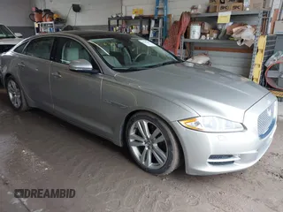 2013 Jaguar XJ Portfolio with VIN SAJWJ2GD0D8V50948, listed as a IAAI auction lot 42067884 with 110,053 mi miles and . Bid and sale history available at DreamBid. Image 1.