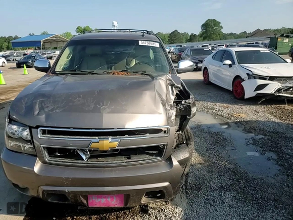 2011 Chevrolet Tahoe LS with VIN 1GNSCAE00BR395849, listed as a Copart auction lot 54750685 with 183,336 mi miles and Salvage title. Bid and sale history available at DreamBid. Image 14.