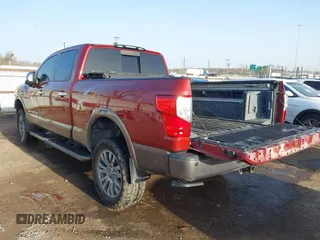 2017 Nissan Titan Pro-4X z VIN 1N6BA1F43HN562377, wystawiony jako IAAI lot #41786607 z przebiegiem 95 207 mil mil oraz . Historia ofert i sprzedaży dostępna na DreamBid. Obrazek 3.