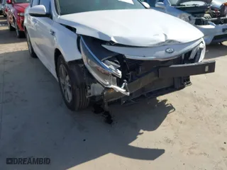 2018 Kia Optima LX with VIN 5XXGT4L30JG236361, listed as a IAAI auction lot 41679129 with 107,068 mi miles. Bid and sale history available at carsss.com. Image 19.