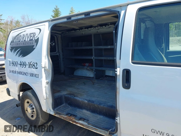 2014 Chevrolet Express Cargo Van with VIN 1GCWGFCA3E1130871, listed as a IAAI auction lot 42166083 with 279,624 mi miles. Bid and sale history available at carsss.com. Image 6.