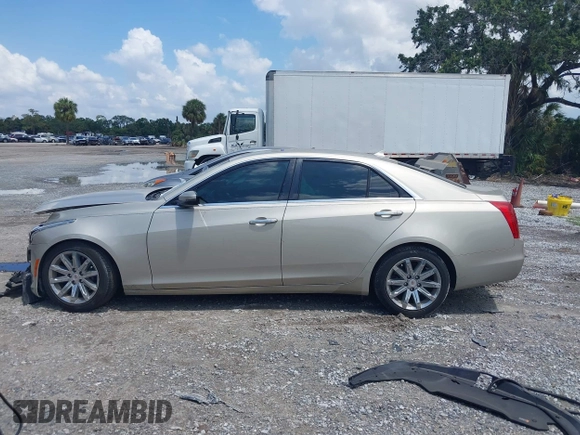 2014 Cadillac CTS Luxury RWD z VIN 1G6AR5SX4E0141195, wystawiony jako IAAI lot #42144565 z przebiegiem 80 267 mil mil oraz . Historia ofert i sprzedaży dostępna na DreamBid. Obrazek 13.