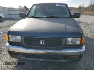 1995 Honda Passport z VIN 4S6CM58V5S4429972, wystawiony jako Copart lot #84513174 z przebiegiem 129 872 mil mil oraz Szkody całkowita. Historia ofert i sprzedaży dostępna na DreamBid. Obrazek 5.