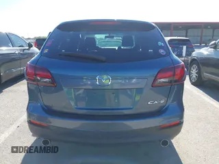 2015 Mazda CX-9 Sport z VIN JM3TB2BAXF0465720, wystawiony jako IAAI lot #42305436 z przebiegiem 130 543 mil mil oraz . Historia ofert i sprzedaży dostępna na DreamBid. Obrazek 16.