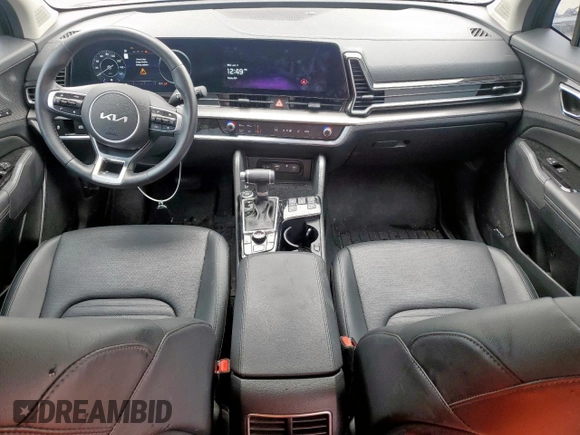 2024 Kia Sportage SX-Prestige with VIN 5XYK53DFXRG206007, listed as a Copart auction lot 60533105 with 6,973 mi miles and Salvage title. Bid and sale history available at DreamBid. Image 8.