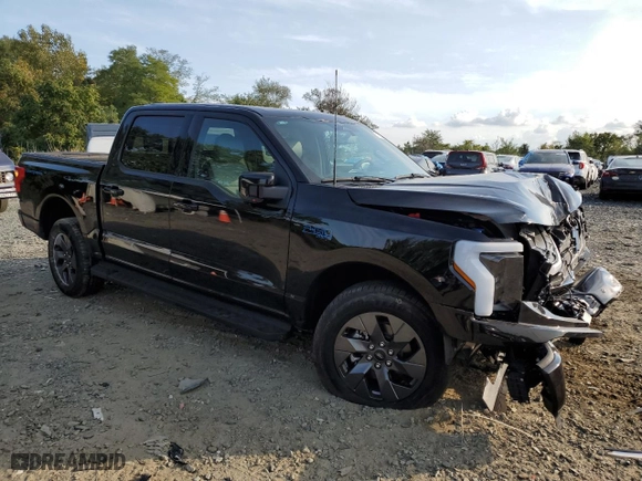 2024 Ford F-150 Lightning LARIAT with VIN 1FT6W5L73RWG03162, listed as a Copart auction lot 71613234 with 1,651 mi miles and Salvage Title. Bid and sale history available at carsss.com. Image 4.