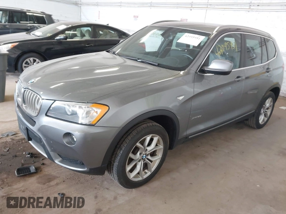 2013 BMW X3 xDrive28i with VIN 5UXWX9C55D0A32404, listed as a IAAI auction lot 42095951 with 165,301 mi miles. Bid and sale history available at carsss.com. Image 2.