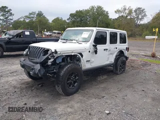 2021 Jeep Wrangler Unlimited Willys with VIN 1C4HJXDN0MW685716, listed as a IAAI auction lot 40837088 with 35,881 mi miles and . Bid and sale history available at DreamBid. Image 17.