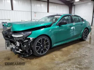 2025 BMW M5 z VIN WBS83FK04SCT95434, wystawiony jako Copart lot #56969865 z przebiegiem Nie podano mil oraz Szkody całkowita. Historia ofert i sprzedaży dostępna na DreamBid. Obrazek 1.