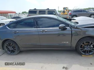 2018 Ford Fusion Hybrid SE with VIN 3FA6P0LU1JR116139, listed as a IAAI auction lot 41933594 with 83,000 mi miles. Bid and sale history available at carsss.com. Image 14.