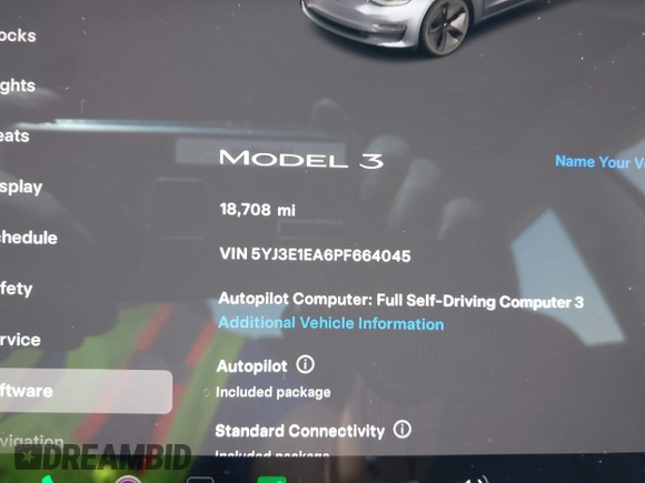 2023 Tesla Model 3 with VIN 5YJ3E1EA6PF664045, listed as a IAAI auction lot 42561039 with 18,708 mi miles and . Bid and sale history available at DreamBid. Image 7.