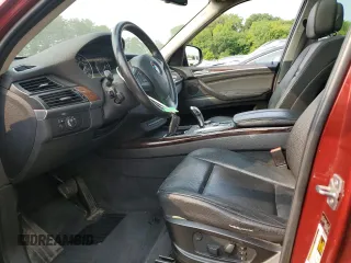 2012 BMW X5 35i z VIN 5UXZV4C56CL749152, wystawiony jako Copart lot #59525155 z przebiegiem 110 773 mil mil oraz Szkoda całkowita • Salvage title. Historia ofert i sprzedaży dostępna na DreamBid. Obrazek 7.